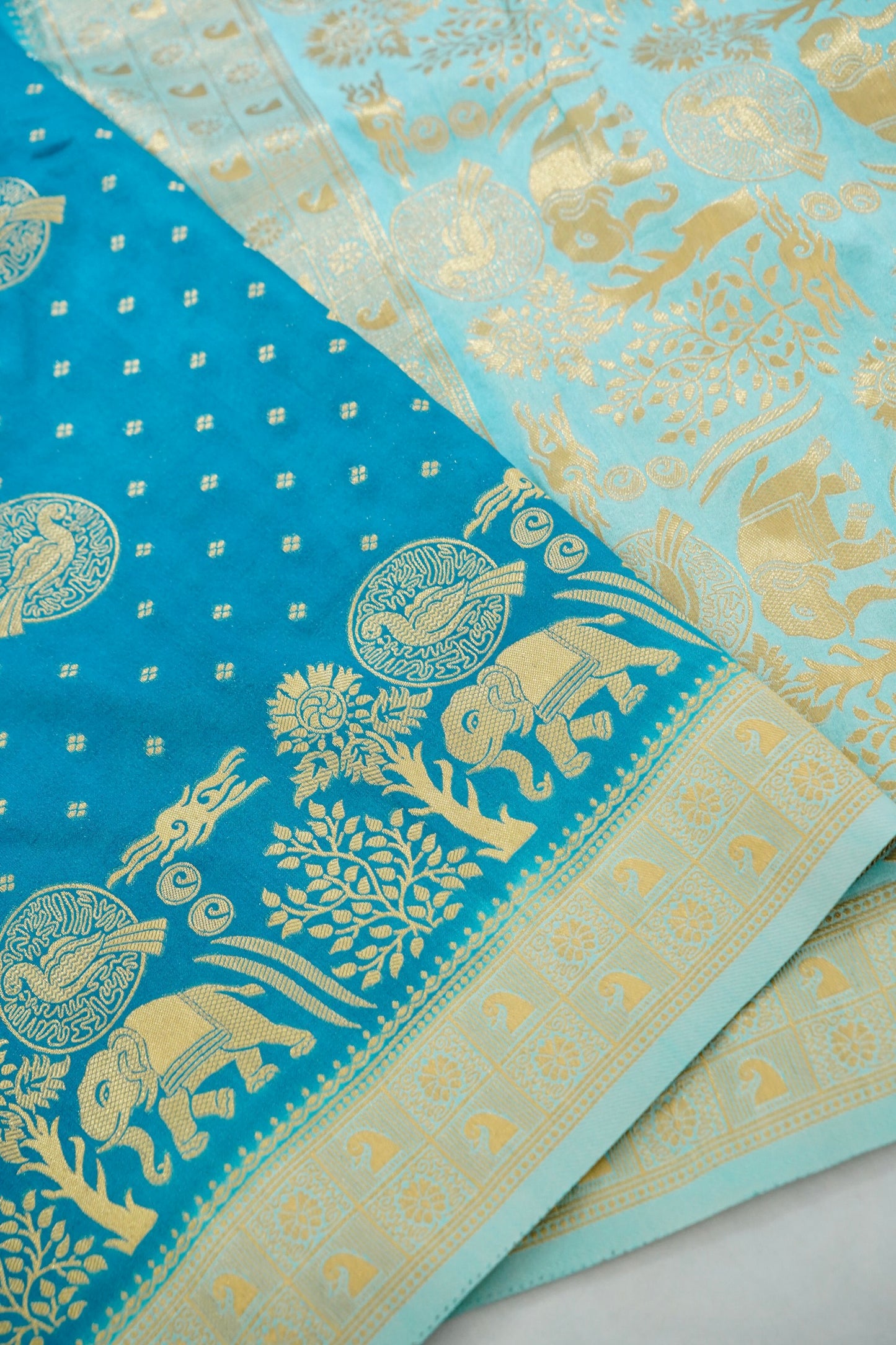 Turquoise Blue Banarasi Silk Saree with Animal Motif Weaves