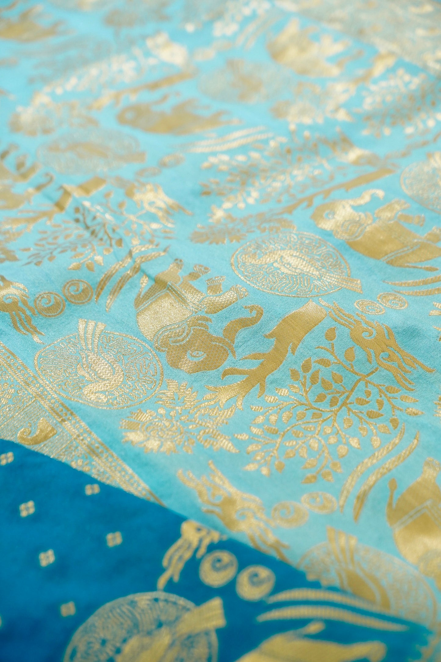 Turquoise Blue Banarasi Silk Saree with Animal Motif Weaves