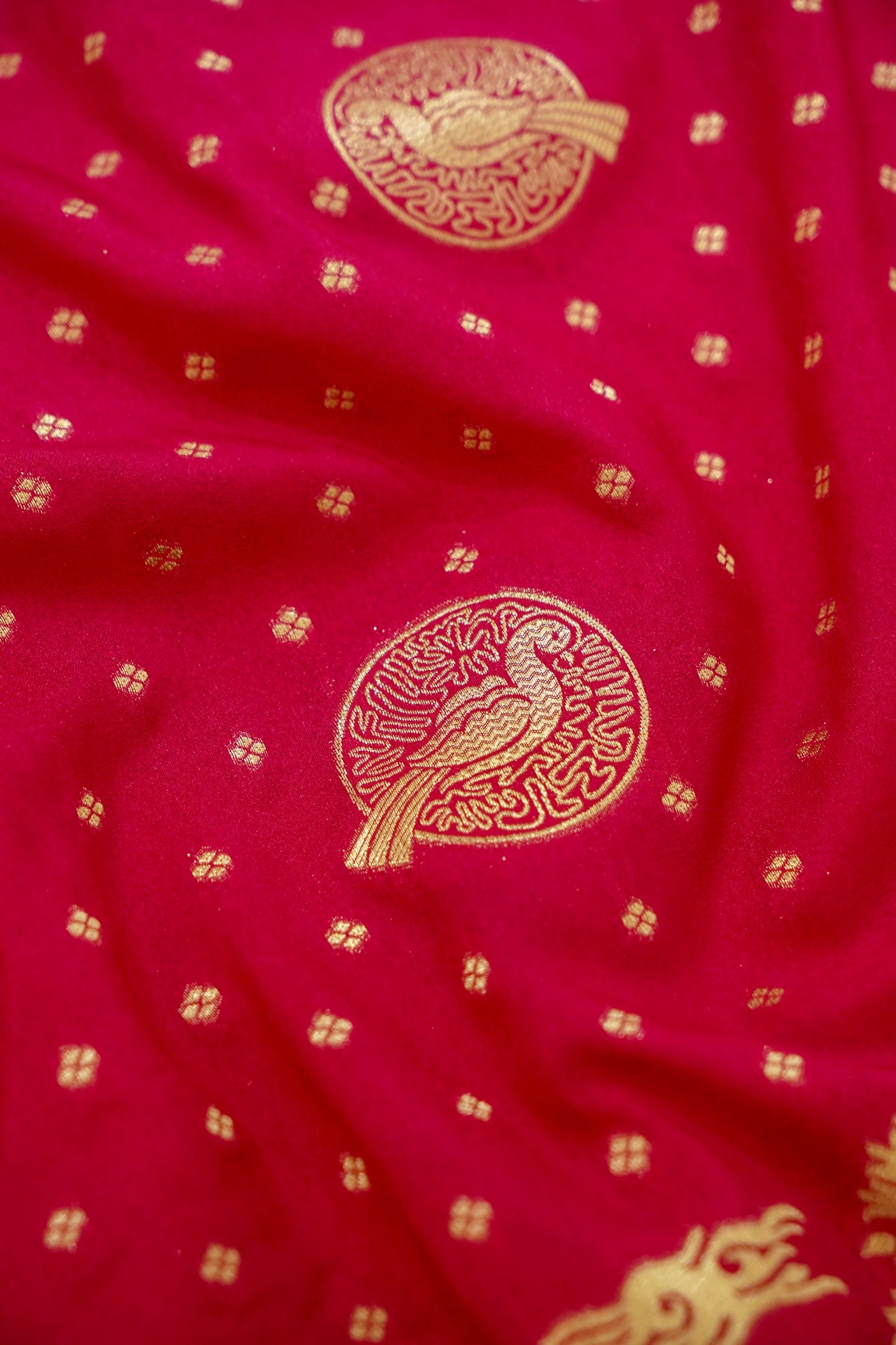 Rani Pink Banarasi Silk Saree with Animal Motif Weaves
