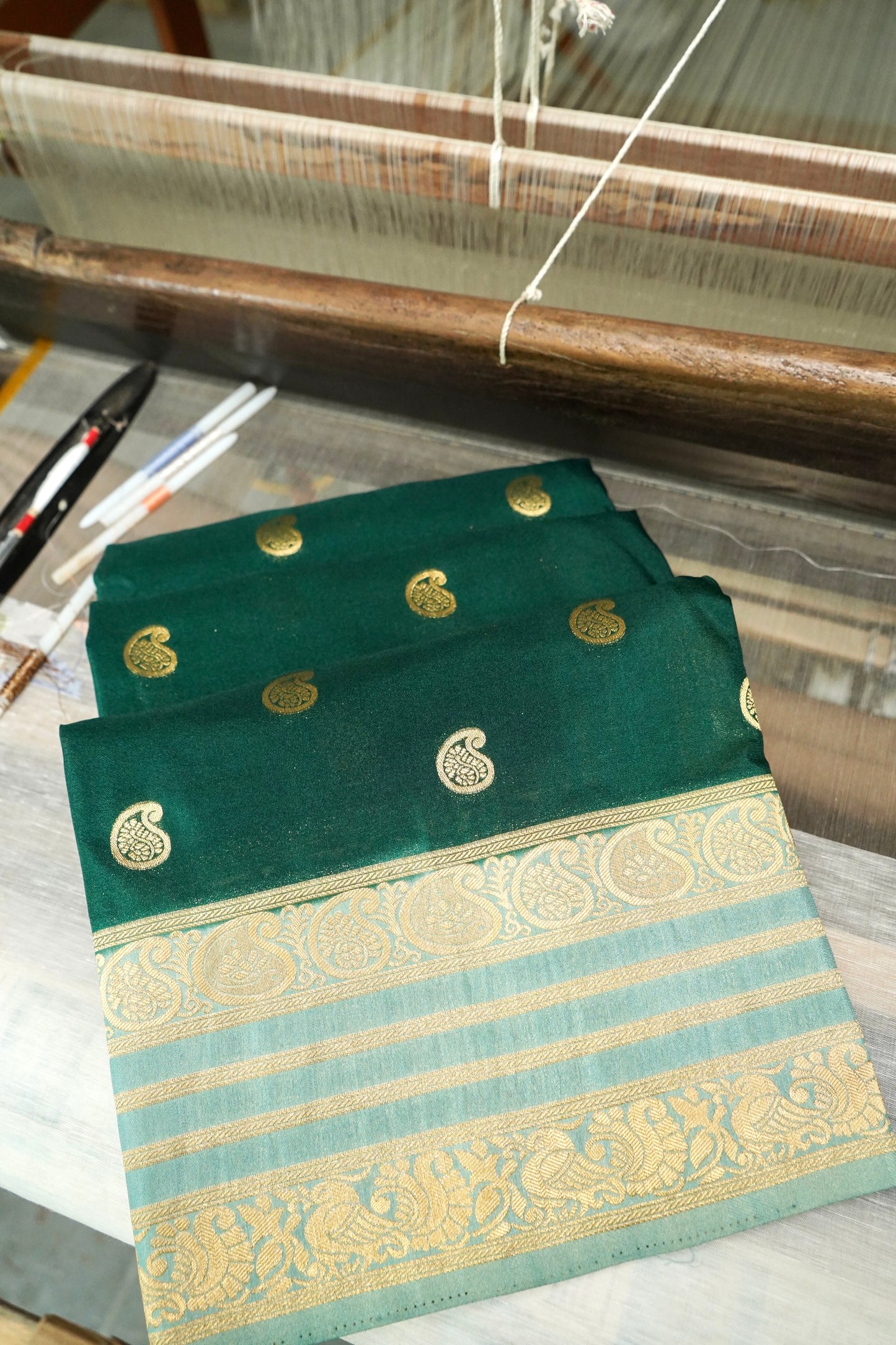Bottle Green Banarasi Silk Saree with Gold Zari Buti Weave & Ivory Gold Border
