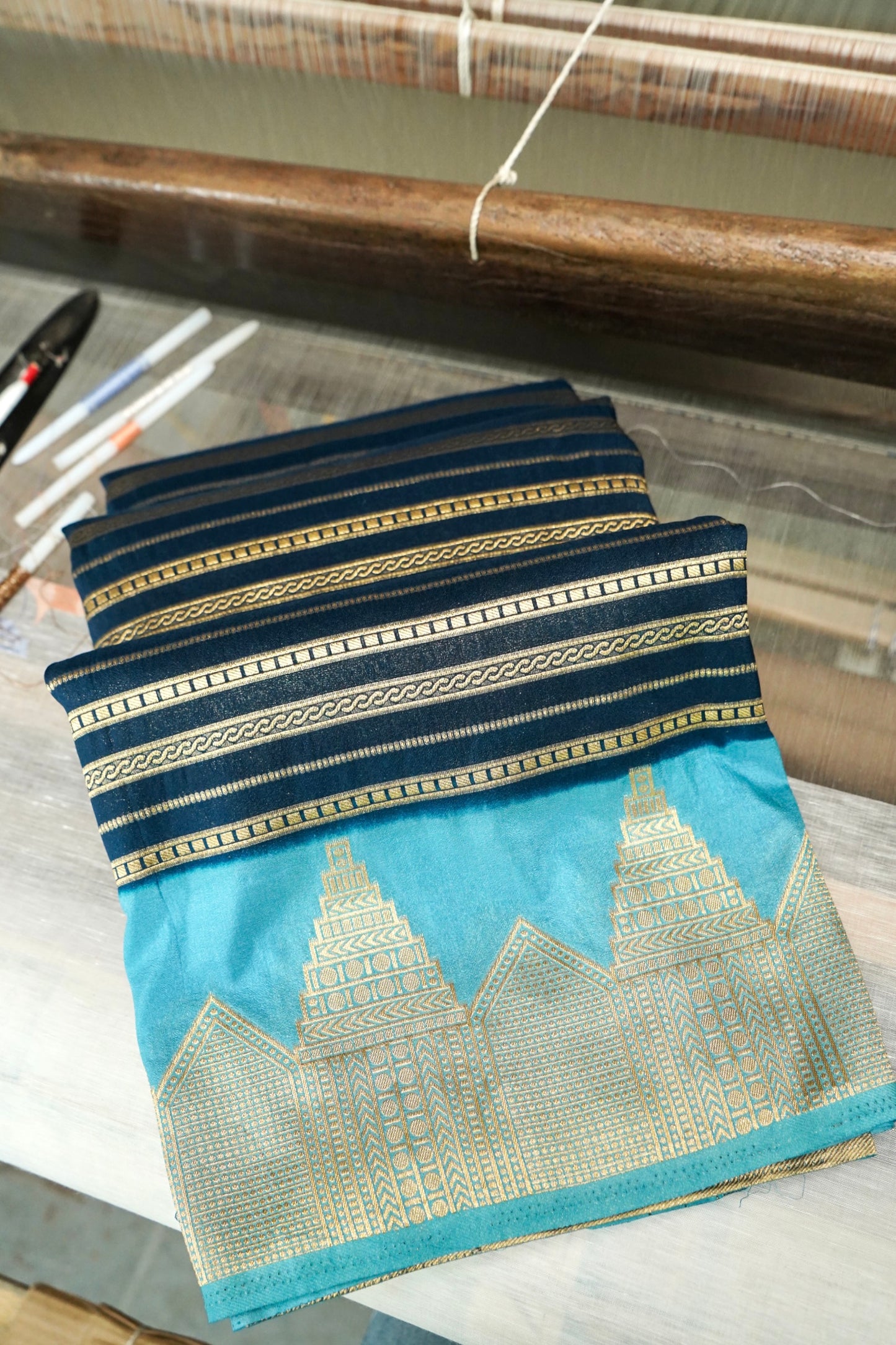 Navy Blue Banarasi Silk Saree with Gold Zari Temple Weave & Sky Blue Border