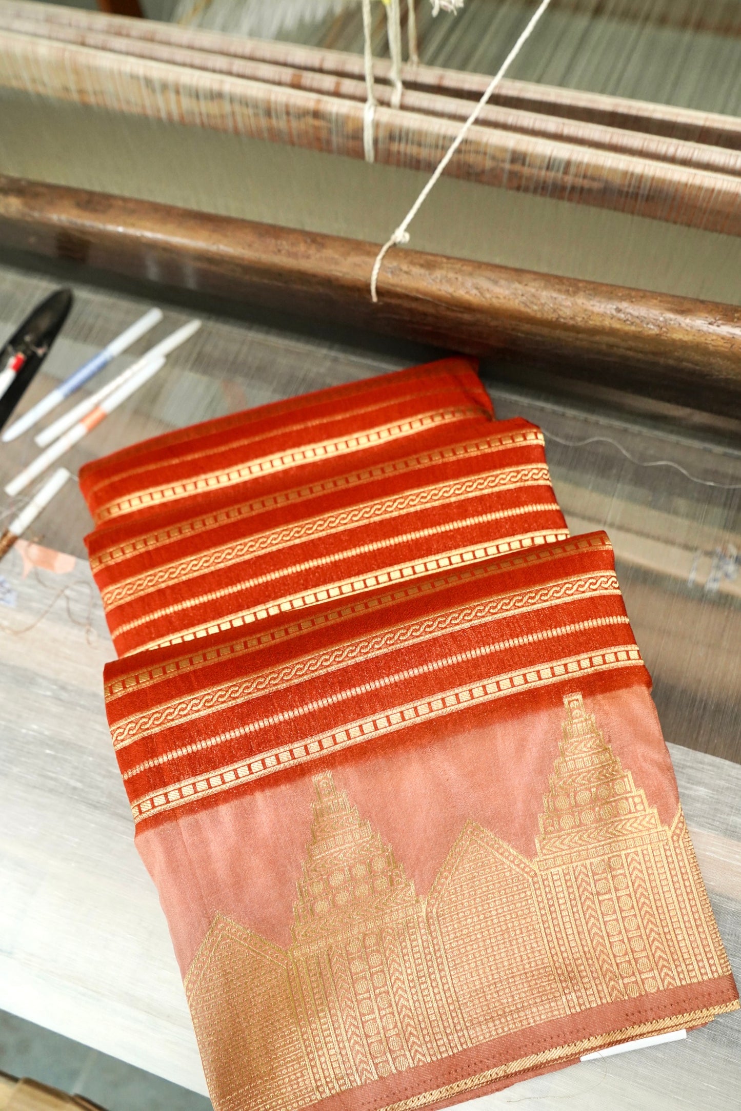 Orange Banarasi Silk Saree with Gold Zari Temple Weave & Peach Border